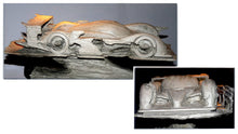 Once the idea has been studied in 2D, a sketch model, or 'maquette', is often made before the clay sculpture (shown here) is created.duce an impression of the new sculpture.