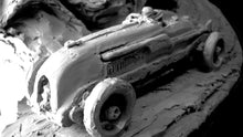 The Dream of Speed, Clay (detail). Birkin setting the new lap record at Brooklands at an average speed of 137mph in his monoposto Special with streamlining and a supercharger.